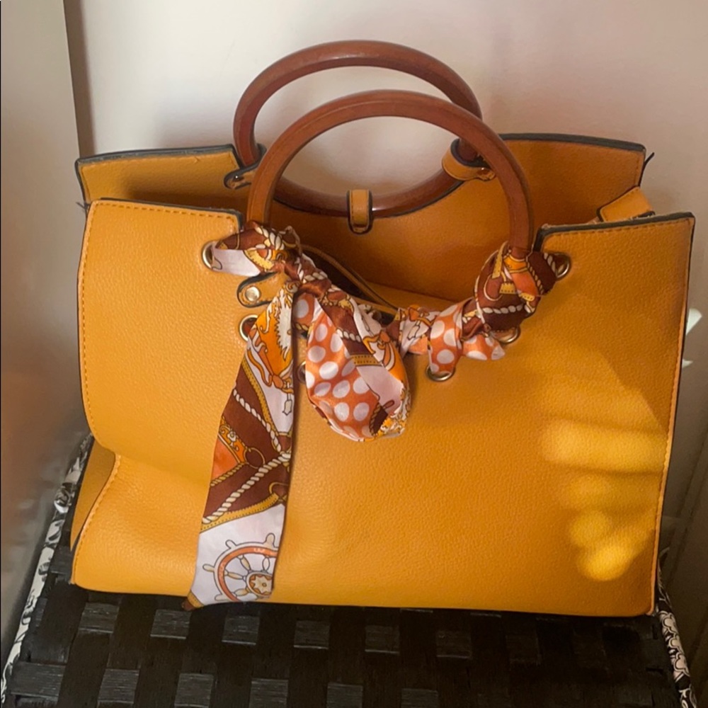 Mustard yellow Dooney and Bourke handbag